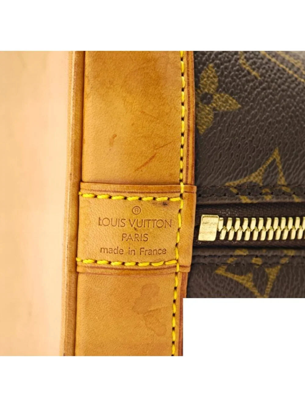 Louis Vuitton Alma Monogram Canvas Handbag
